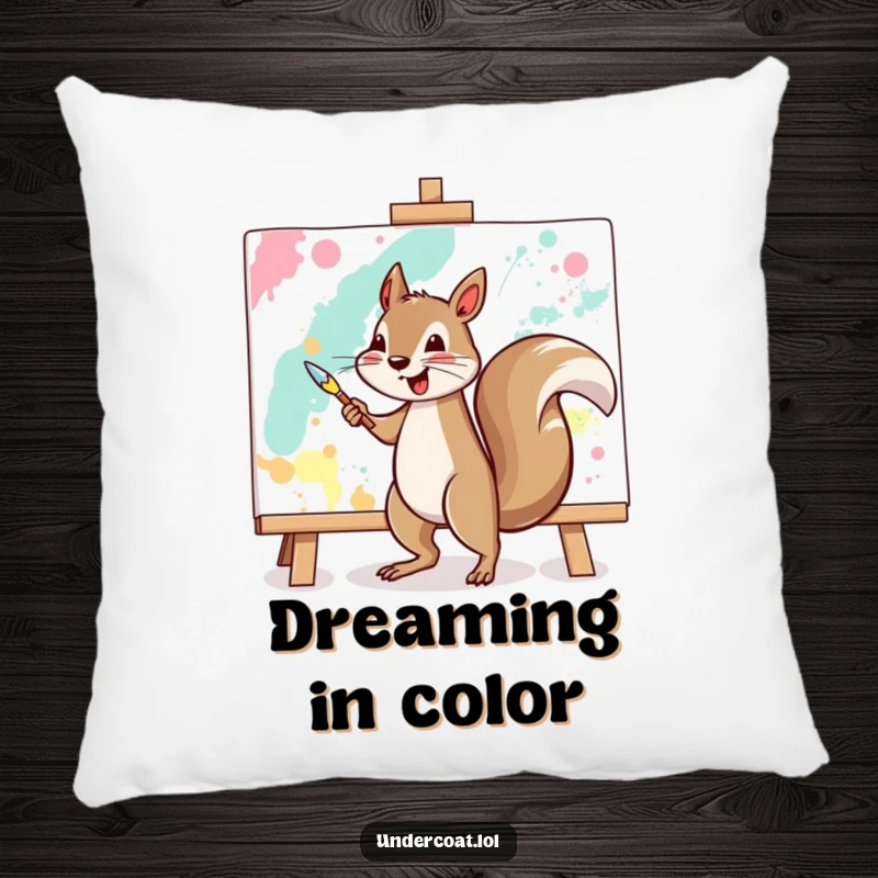 Funny squirrel pillow with a cheerful squirrel vigorously painting a large abstract canvas, perfect for artistic comfort.