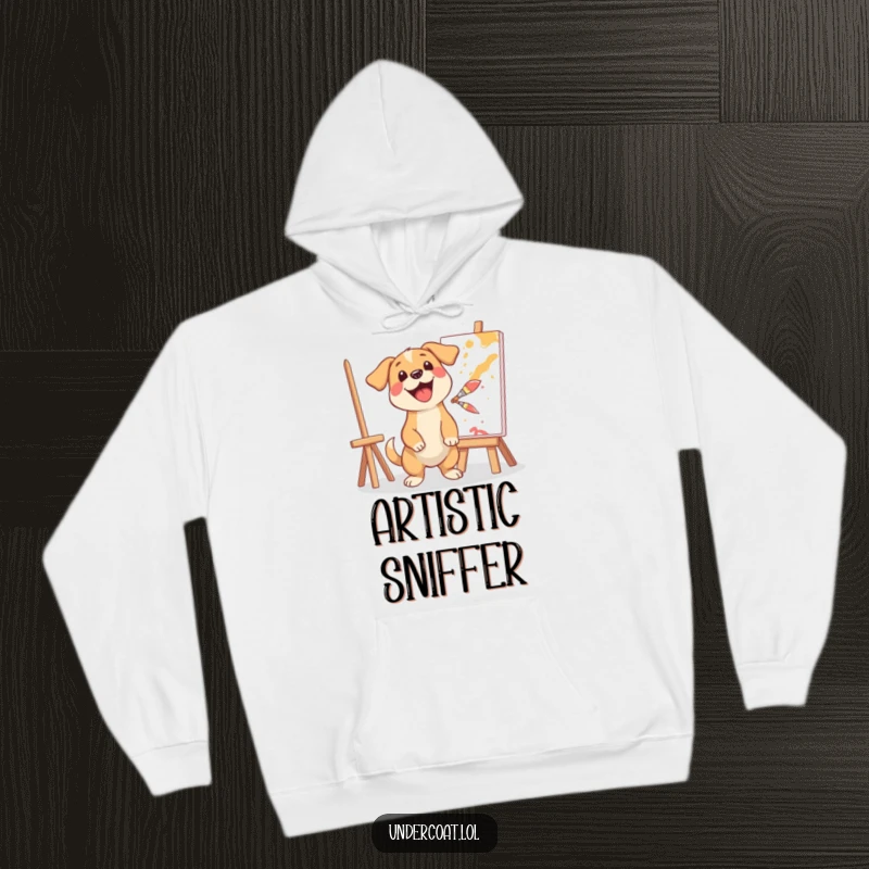 Funny hoodie with a happy dog artist excitedly splashing paint onto a canvas, designed for warmth and creative humor.