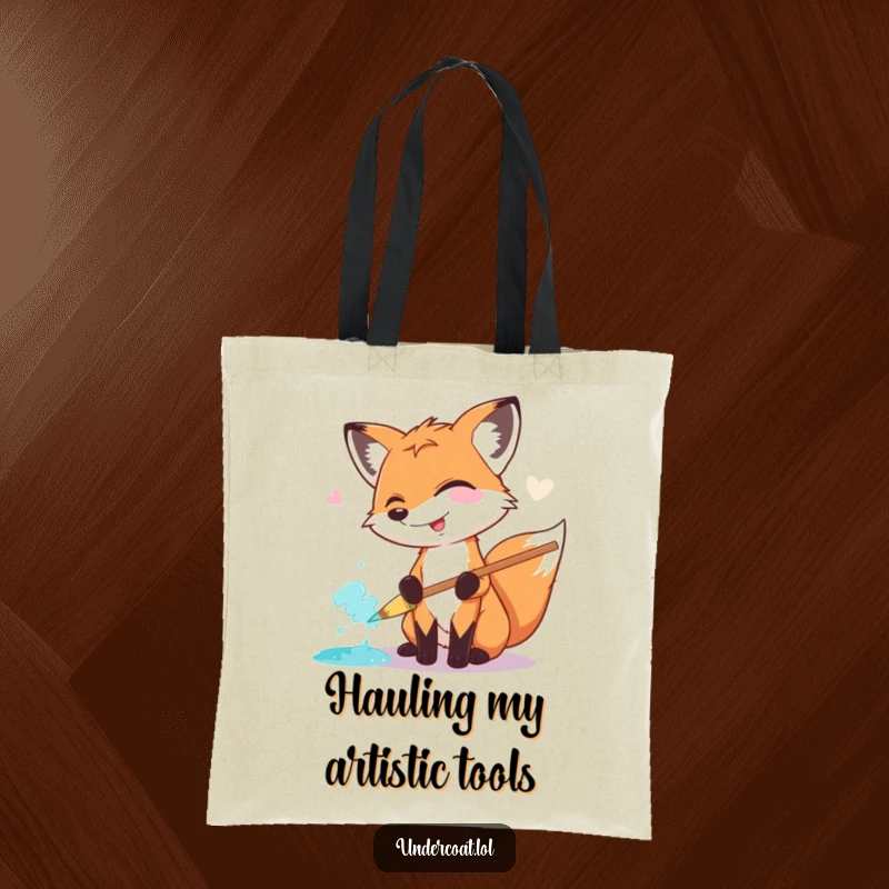 Funny Fox Painter Tote Bag: A giggling fox artist uses a huge pastel brush to smear paint, perfect for carrying art supplies.